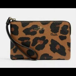 NEW leopard Coach wristlet - hasn’t been opened!!
